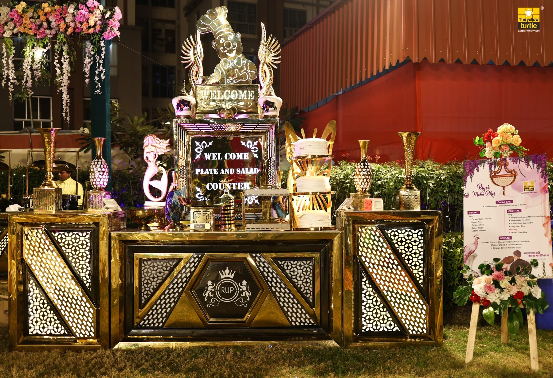 Decorative outdoor buffet counter by The Yellow Turtle Catering